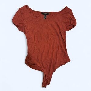Burnt reddish orange versatile body suit